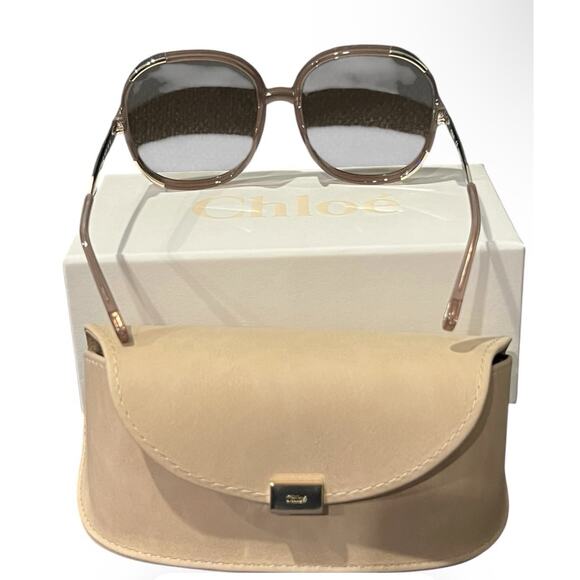 Chloé CE712S sunglasses feature a distinct brown and gold oversized round frame main image 6